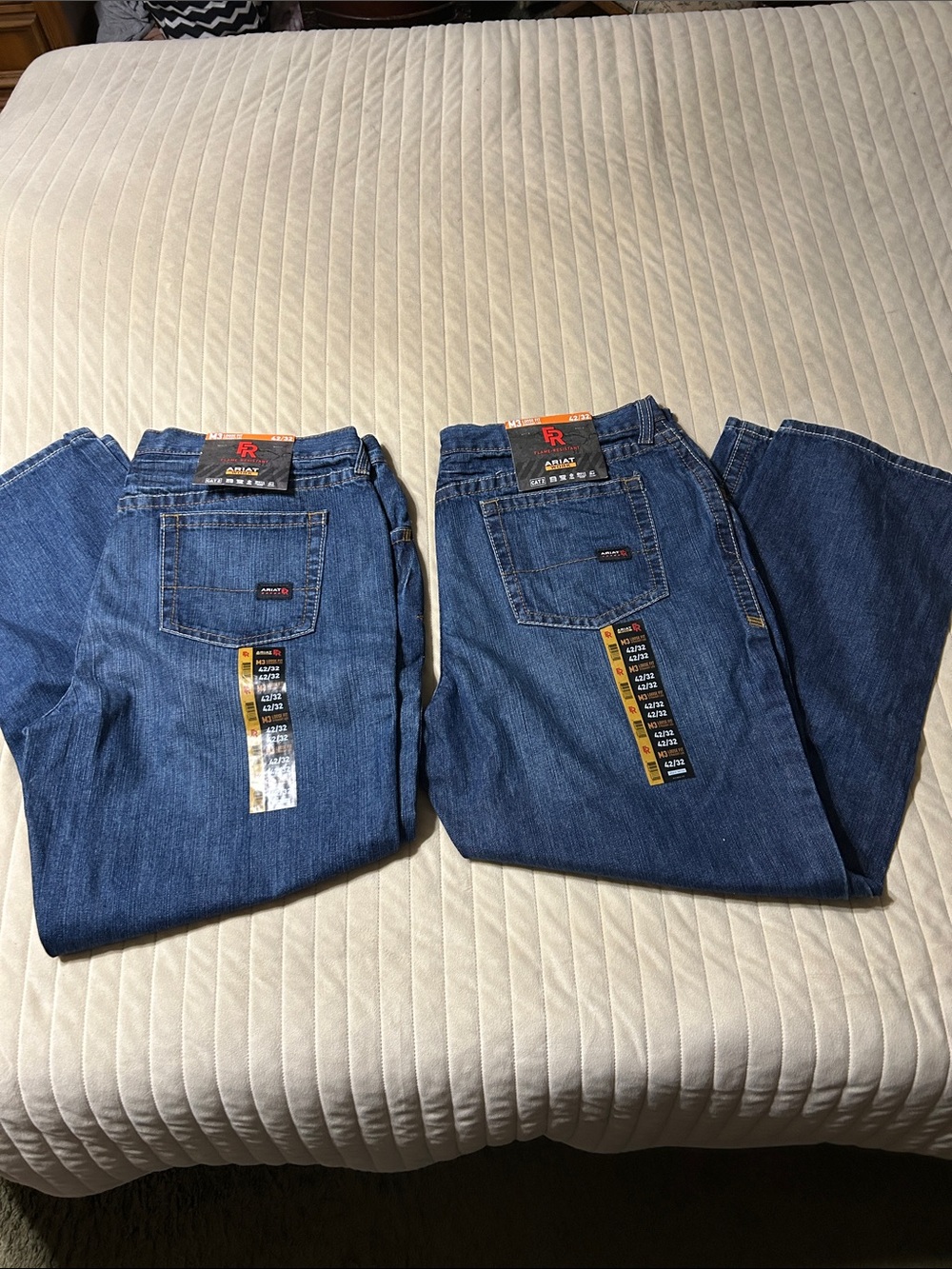 2 pairs Ariat Men's flame resistant waist 42 length 32 Jeans